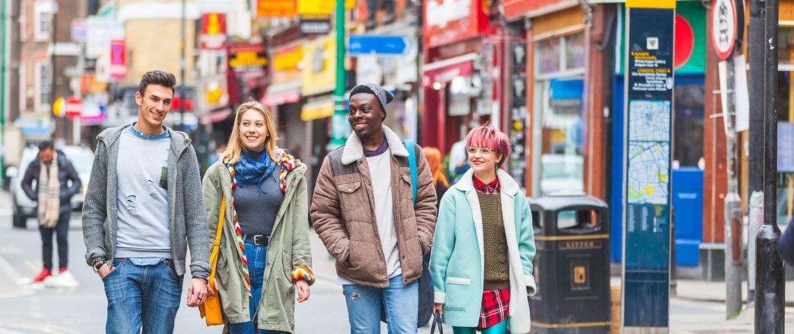 Group of young friends walking in London